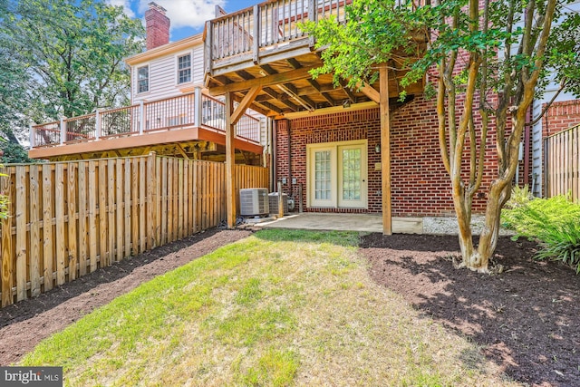 4410 S Pershing Ct, Arlington, VA 22204 - view of yard featuring central air condition unit, a deck, and a patio area