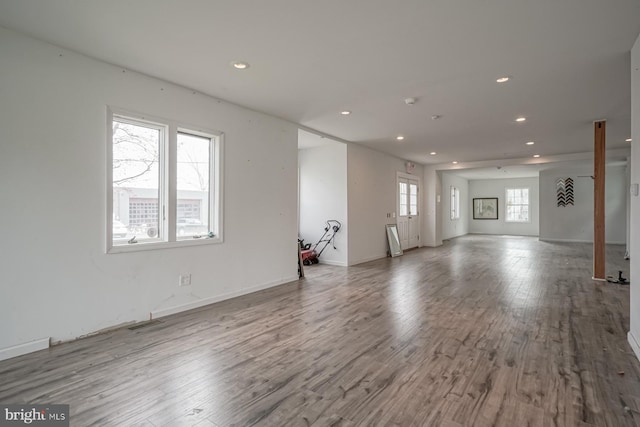 318 12th St, Hammonton, NJ 08037 - unfurnished living room featuring wood finished floors, recessed lighting, and baseboards
