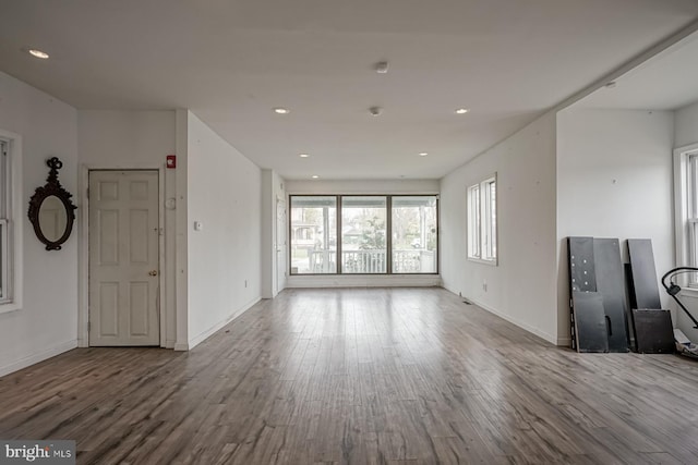 318 12th St, Hammonton, NJ 08037 - unfurnished living room featuring wood finished floors, recessed lighting, and baseboards