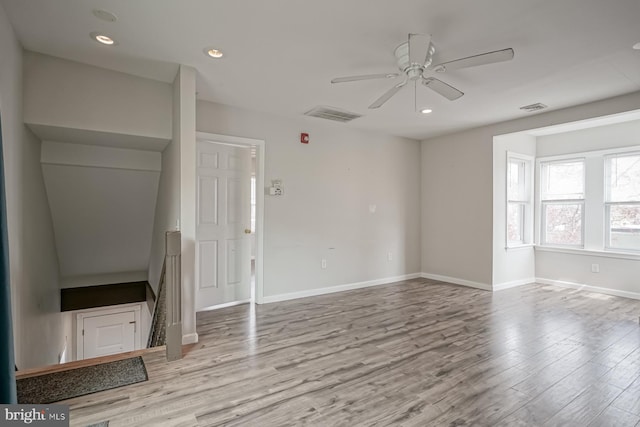 318 12th St, Hammonton, NJ 08037 - unfurnished living room with ceiling fan, wood finished floors, baseboards, and recessed lighting