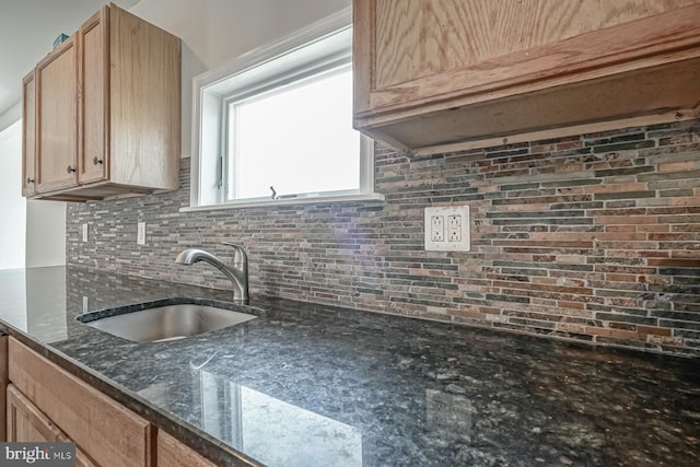 318 12th St, Hammonton, NJ 08037 - kitchen with a sink, decorative backsplash, dark stone counters, and light brown cabinetry