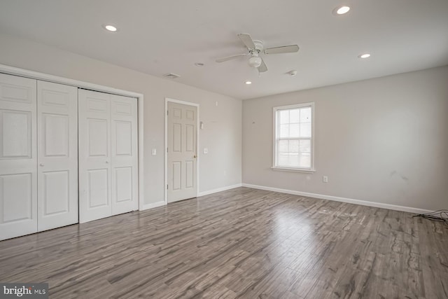 318 12th St, Hammonton, NJ 08037 - unfurnished bedroom featuring wood finished floors, recessed lighting, a closet, baseboards, and ceiling fan