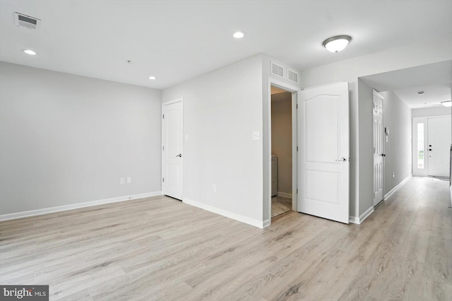 7710 Village Park Dr, Baltimore, MD 21222 - empty room with light wood-type flooring, baseboards, and recessed lighting