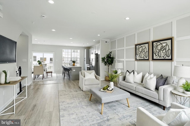 7710 Village Park Dr, Baltimore, MD 21222 - living area featuring recessed lighting and light wood finished floors