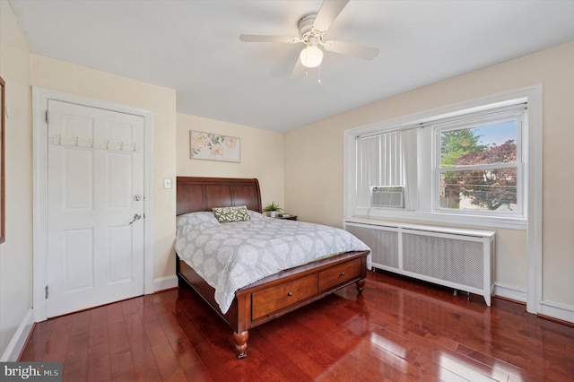 7200 Wayne Ave, Upper Darby, PA 19082 - bedroom with radiator heating unit, hardwood / wood-style floors, baseboards, and cooling unit