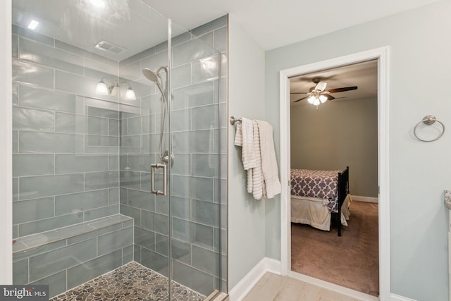 14520 Fairdale Rd, Silver Spring, MD 20905 - bathroom with connected bathroom, a tile shower, a ceiling fan, and baseboards