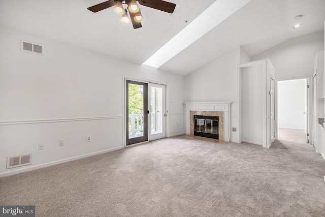 12200 Eagles Nest Ct Unit L, Germantown, MD 20874 - unfurnished living room with vaulted ceiling, light carpet, a ceiling fan, a high end fireplace, and baseboards