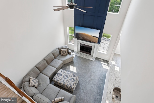 1112 Cornwallis Way, Collegeville, PA 19426 - living area with ceiling fan, a premium fireplace, and a high ceiling