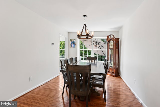 1112 Cornwallis Way, Collegeville, PA 19426 - dining room featuring a chandelier, hardwood / wood-style flooring, and baseboards