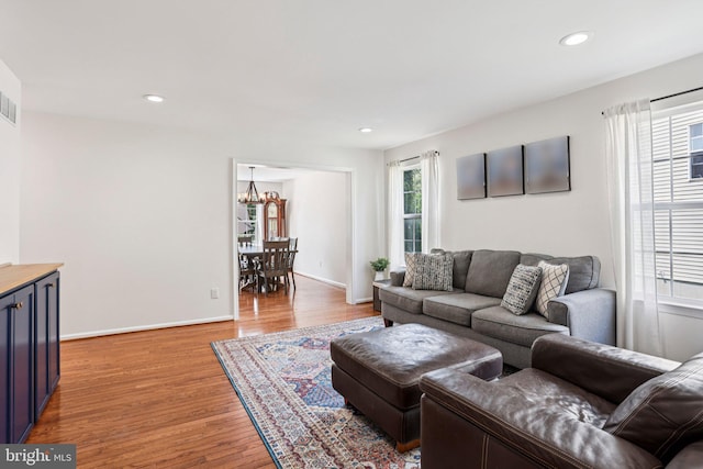 1112 Cornwallis Way, Collegeville, PA 19426 - living area featuring a chandelier, light wood finished floors, recessed lighting, and baseboards