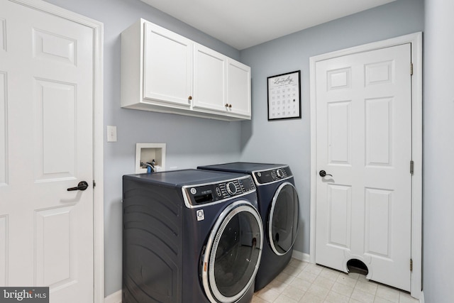 1112 Cornwallis Way, Collegeville, PA 19426 - laundry area with cabinet space, washing machine and dryer, baseboards, and light tile patterned flooring
