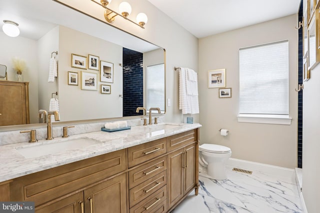 1112 Cornwallis Way, Collegeville, PA 19426 - bathroom featuring marble finish flooring, double vanity, toilet, and baseboards