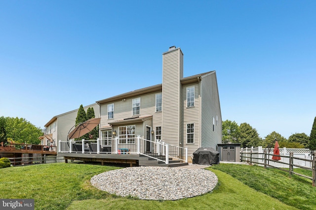 1112 Cornwallis Way, Collegeville, PA 19426 - rear view of house featuring a wooden deck and a chimney