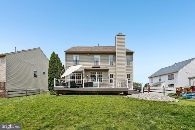 1112 Cornwallis Way, Collegeville, PA 19426 - back of property with a wooden deck and a chimney
