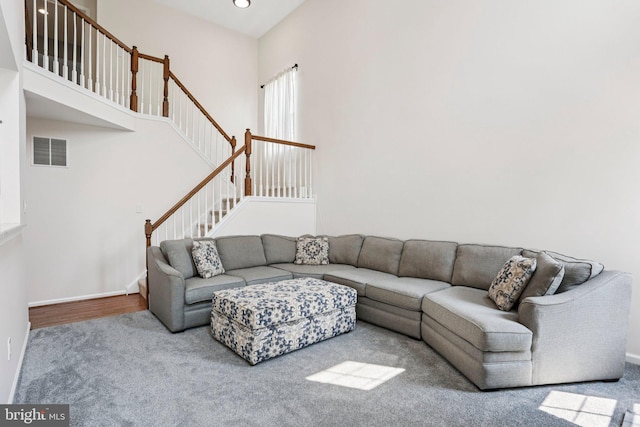 1112 Cornwallis Way, Collegeville, PA 19426 - carpeted living room featuring stairs, baseboards, and recessed lighting