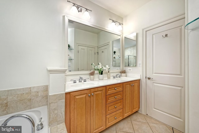 404 Oronoco St, Alexandria, VA 22314 - full bath with double vanity, a tub to relax in, and tile patterned floors