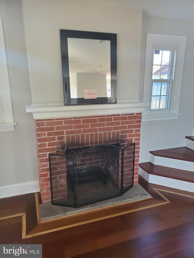3004 Dekalb Pike, East Norriton, PA 19401 - detailed view of a brick fireplace, wood finished floors, and baseboards