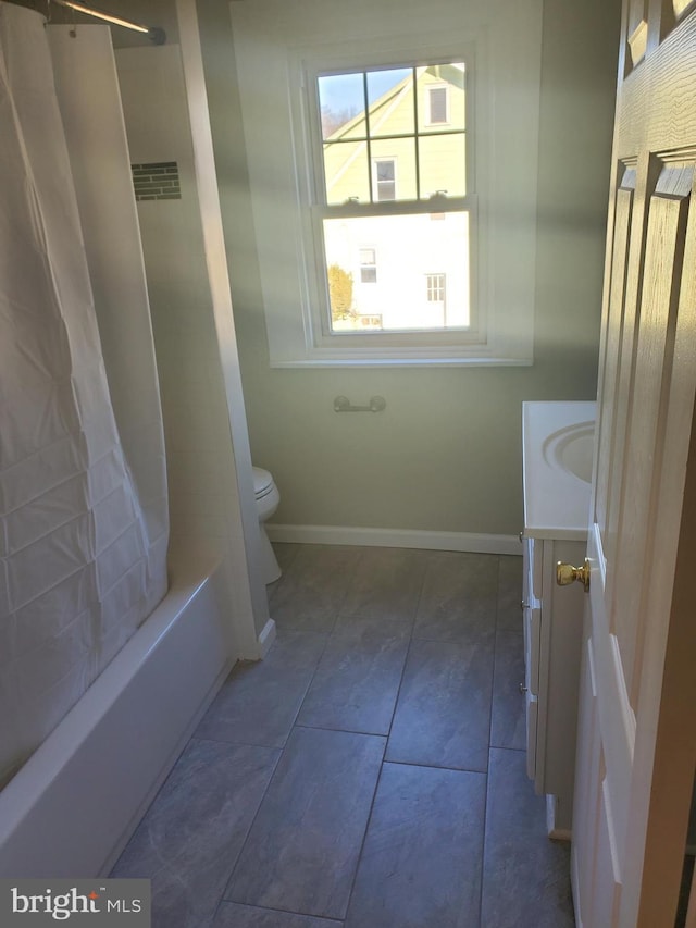 3004 Dekalb Pike, East Norriton, PA 19401 - full bath featuring vanity, toilet, shower / bath combination with curtain, baseboards, and tile patterned floors