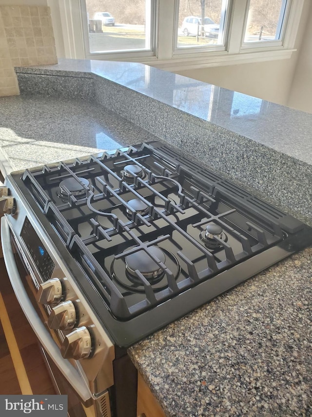 3004 Dekalb Pike, East Norriton, PA 19401 - kitchen view of stainless steel gas range and tasteful backsplash