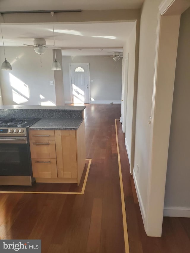 3004 Dekalb Pike, East Norriton, PA 19401 - kitchen with a ceiling fan, stainless steel stove, dark wood finished floors, dark countertops, and light brown cabinets
