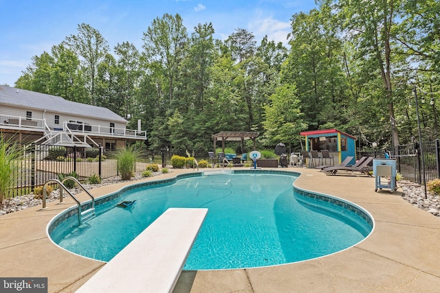 26471 N Sandgates Rd, Mechanicsville, MD 20659 - view of swimming pool featuring a pergola, a diving board, a patio area, and a gazebo