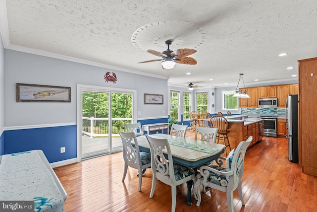 26471 N Sandgates Rd, Mechanicsville, MD 20659 - dining space with light wood-type flooring, a textured ceiling, recessed lighting, baseboards, and ceiling fan