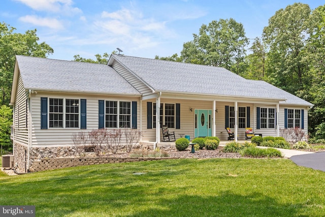 26471 N Sandgates Rd, Mechanicsville, MD 20659 - ranch-style home with covered porch, a front lawn, roof with shingles, and central AC unit
