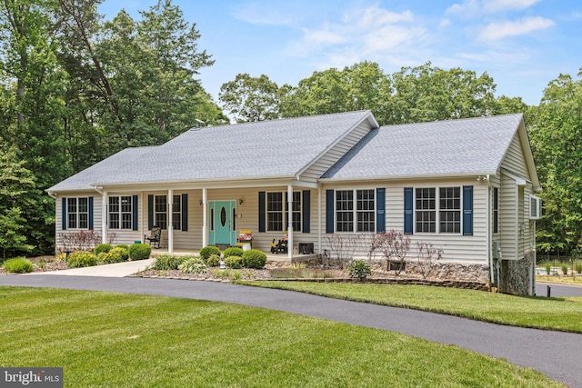 26471 N Sandgates Rd, Mechanicsville, MD 20659 - single story home with covered porch, a front lawn, and roof with shingles