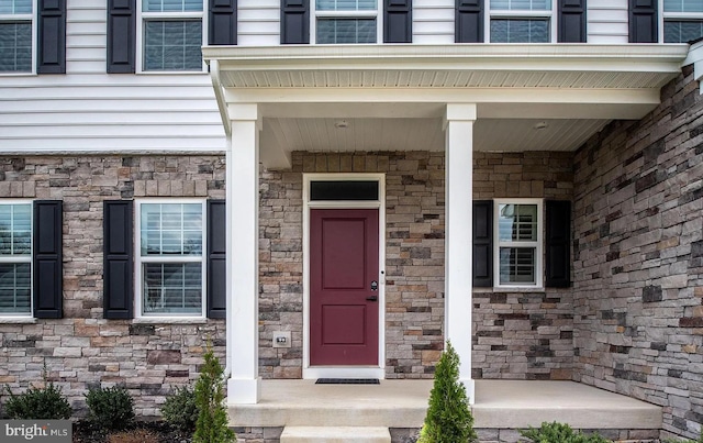 202 Grisham Rd, Stafford, VA 22554 - property entrance featuring stone siding and covered porch