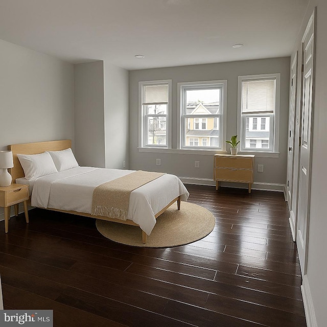 5603 Florence Ave, Philadelphia, PA 19143 - bedroom with multiple windows, dark wood-style floors, baseboards, and recessed lighting