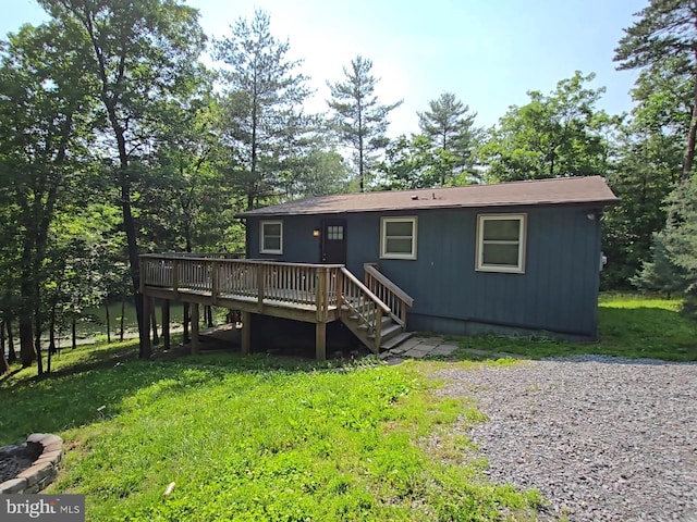 165 Village Dr, Hedgesville, WV 25427 - rear view of property with a wooden deck