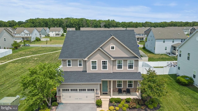 8798 Bancroft Dr, Waldorf, MD 20603 - view of front of property with a garage, a residential view, roof with shingles, and stone siding