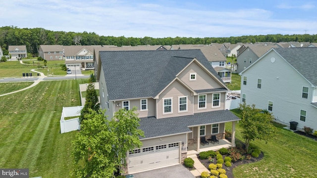 8798 Bancroft Dr, Waldorf, MD 20603 - view of front of house with a shingled roof, an attached garage, a residential view, and asphalt driveway