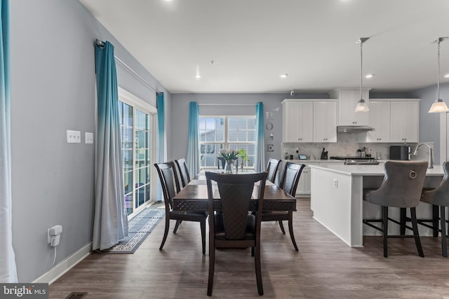 8798 Bancroft Dr, Waldorf, MD 20603 - dining area with dark wood-style floors, recessed lighting, and baseboards