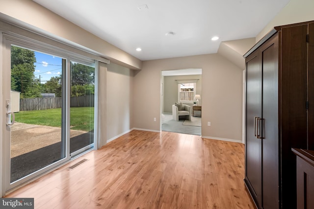3011 Spark Ln, Bowie, MD 20715 - unfurnished bedroom with light wood-style flooring, access to outside, and recessed lighting