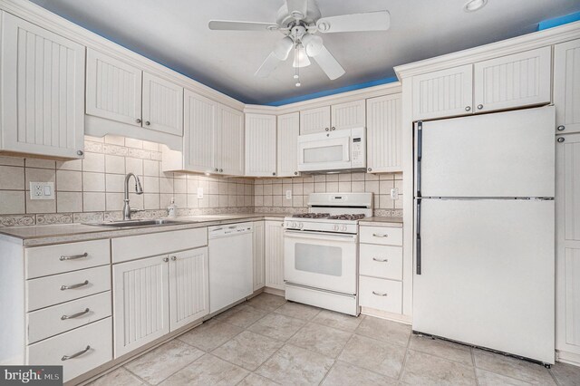 453 Old Elm St, Conshohocken, PA 19428 - kitchen with white appliances, backsplash, ceiling fan, and light countertops