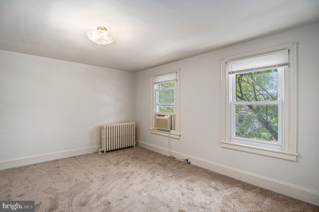 453 Old Elm St, Conshohocken, PA 19428 - empty room featuring radiator heating unit, carpet flooring, and cooling unit