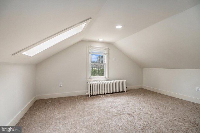 453 Old Elm St, Conshohocken, PA 19428 - bonus room featuring radiator, a skylight, vaulted ceiling, carpet, and recessed lighting