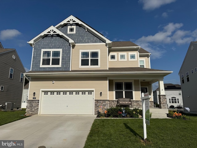 1126 Up And Over Ln, Aberdeen, MD 21001 - craftsman-style house with covered porch, an attached garage, a front lawn, and driveway