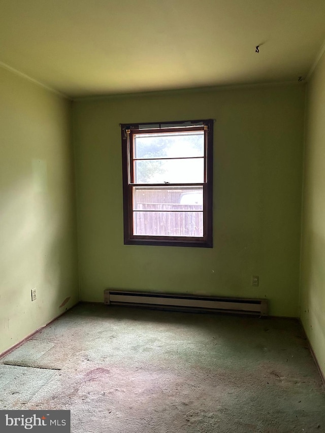 7303 Leona St, District Heights, MD 20747 - carpeted empty room with baseboard heating