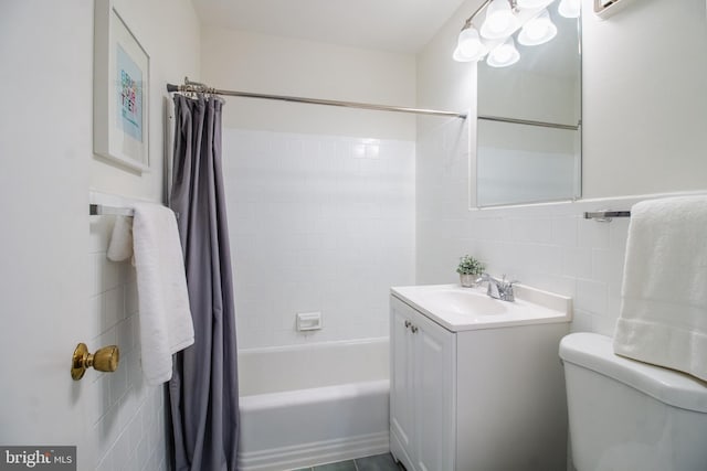 11510 Bucknell Dr Unit 201, Silver Spring, MD 20902 - bathroom featuring shower / tub combo with curtain, vanity, and tile walls