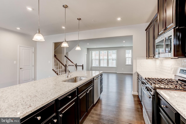 9608 Julia Ln, Owings Mills, MD 21117 - kitchen with appliances with stainless steel finishes, a sink, dark wood-type flooring, light stone counters, and open floor plan