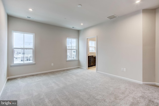 9608 Julia Ln, Owings Mills, MD 21117 - spare room with light colored carpet, baseboards, and recessed lighting