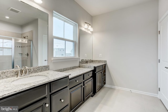 9608 Julia Ln, Owings Mills, MD 21117 - bathroom with vanity, a shower stall, plenty of natural light, and baseboards