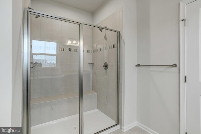 9608 Julia Ln, Owings Mills, MD 21117 - full bathroom featuring a shower stall and baseboards