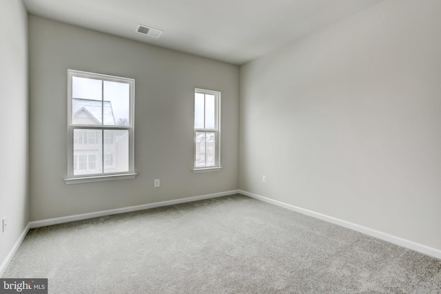 9608 Julia Ln, Owings Mills, MD 21117 - empty room featuring carpet and plenty of natural light