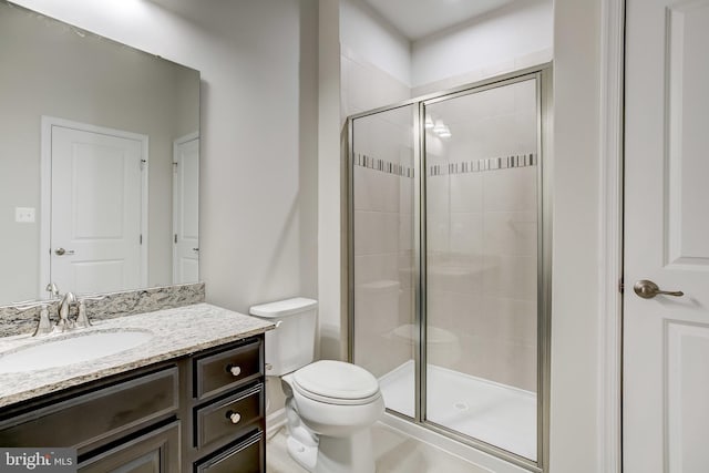 9608 Julia Ln, Owings Mills, MD 21117 - bathroom featuring toilet, vanity, and a shower stall