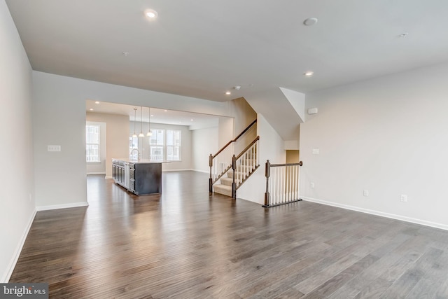 9608 Julia Ln, Owings Mills, MD 21117 - unfurnished living room with dark wood-type flooring, stairway, baseboards, and recessed lighting