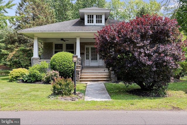 28 N Wakefield, Jeffersonville, PA 19403 - view of front of property featuring a porch, a front yard, ceiling fan, a shingled roof, and french doors