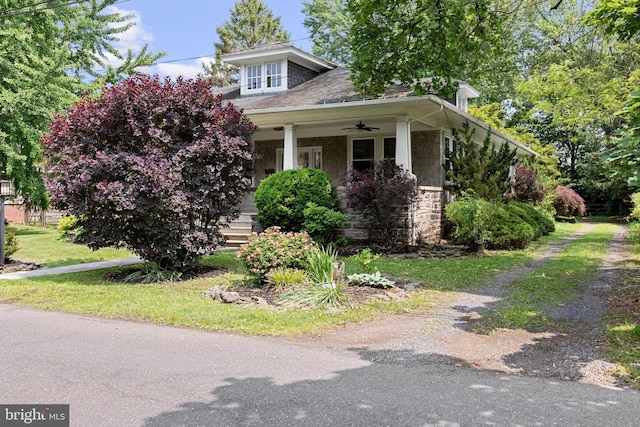28 N Wakefield, Jeffersonville, PA 19403 - view of front of property featuring a porch, stone siding, ceiling fan, roof with shingles, and stairs